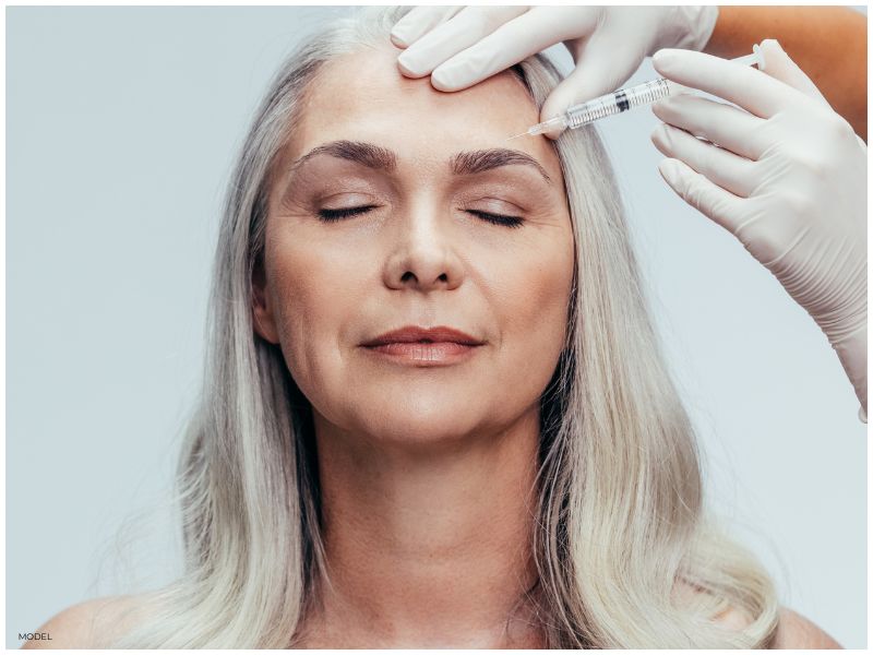 Stock Image- Model Receiving Forehead Injection